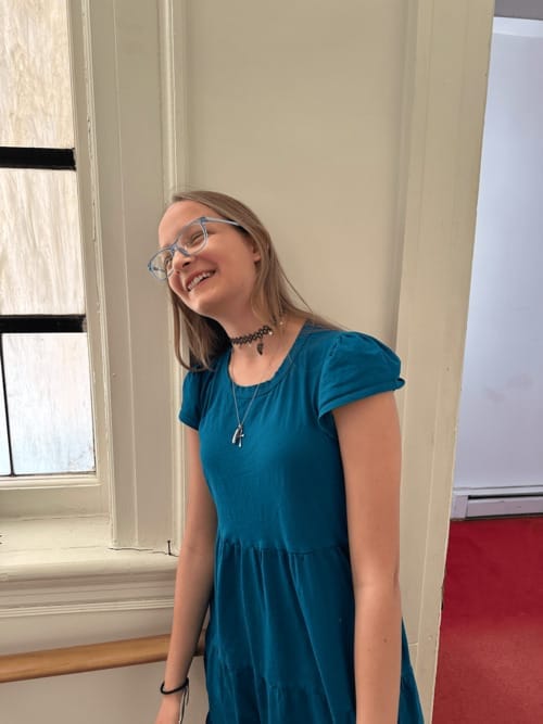 A smiling First Baptist Church volunteer